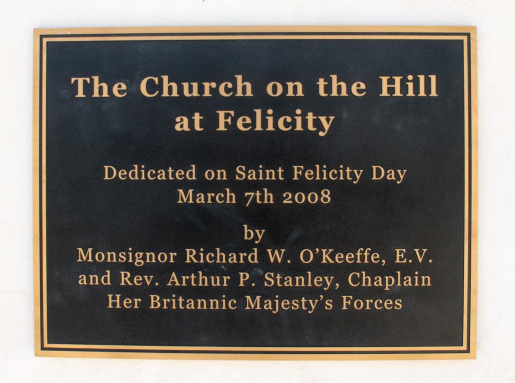 The Sign from Church on the top of the hill at Center of the world.